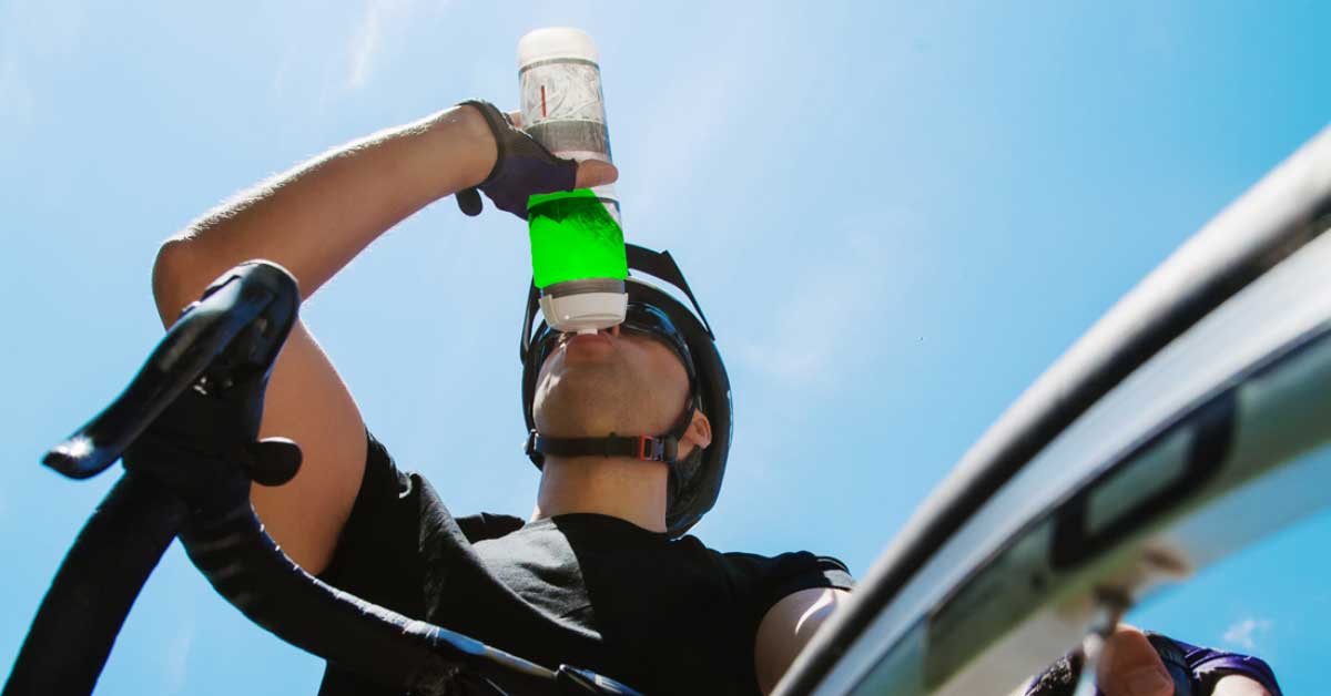 cyclist drinking staminade